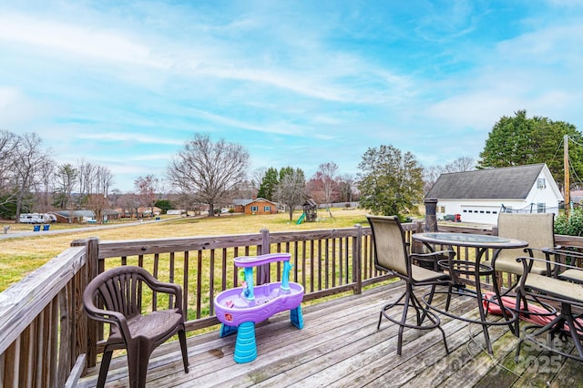 wooden deck with a yard