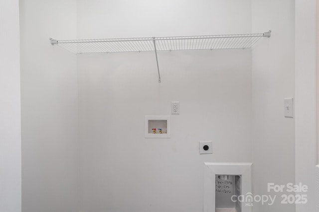 washroom featuring hookup for a washing machine and electric dryer hookup