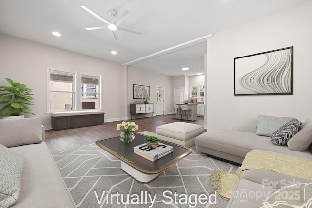 living room with ceiling fan, baseboards, wood finished floors, and recessed lighting