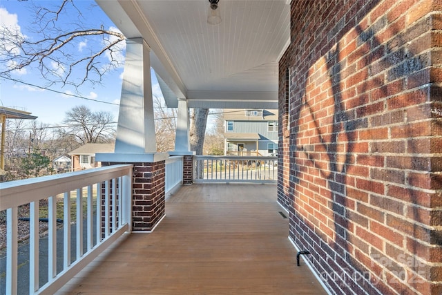 balcony featuring covered porch