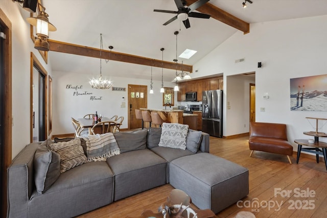 living area with beamed ceiling, visible vents, high vaulted ceiling, light wood-style flooring, and ceiling fan with notable chandelier