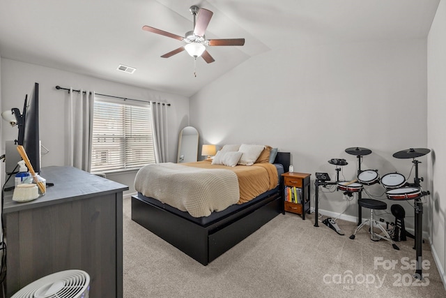 bedroom with visible vents, light carpet, baseboards, ceiling fan, and vaulted ceiling