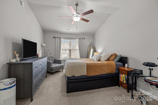 bedroom featuring visible vents, light colored carpet, a ceiling fan, and vaulted ceiling