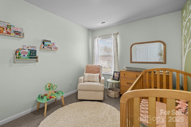 bedroom with carpet, visible vents, and baseboards