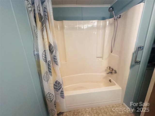 bathroom with shower / bath combo