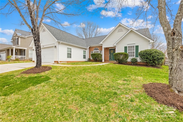 view of front of home with concrete driveway, an attached garage, and a front yard