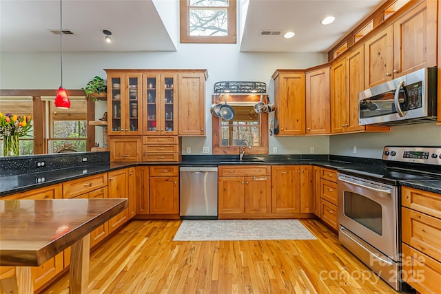 20 Meeks Rd, Black Mountain, NC 28711 - kitchen featuring appliances with stainless steel finishes, light wood finished floors, a sink, and visible vents