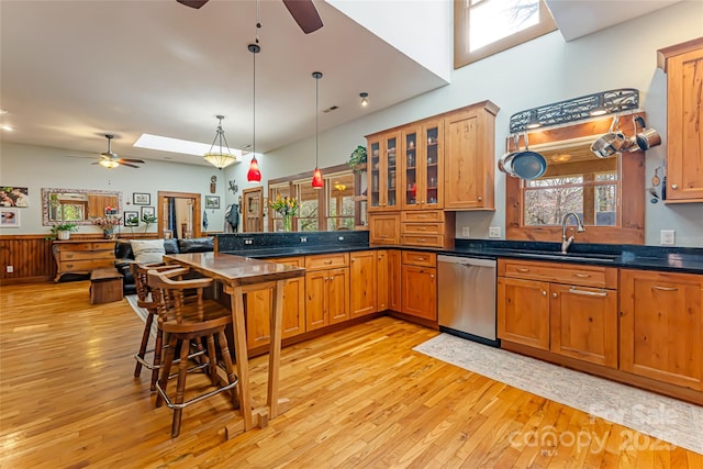 20 Meeks Rd, Black Mountain, NC 28711 - kitchen featuring a peninsula, light wood-type flooring, a ceiling fan, dishwasher, and a sink