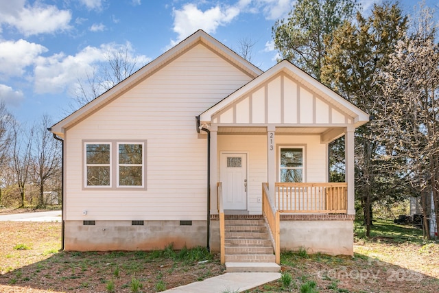 bungalow with crawl space and a porch