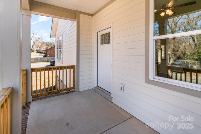 doorway to property featuring covered porch