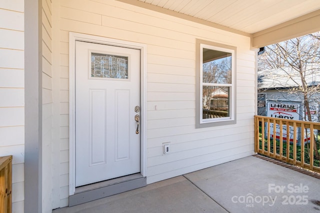 property entrance with a porch