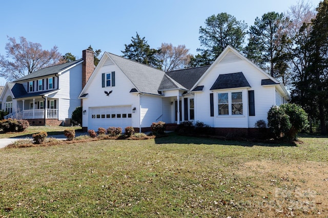 view of front facade featuring a front lawn and a garage