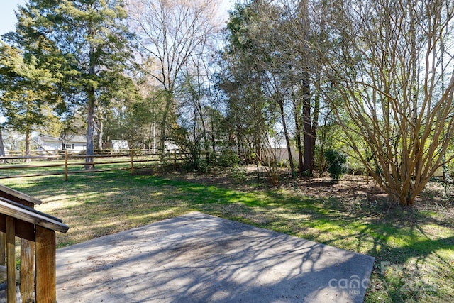 view of yard with a patio area and fence