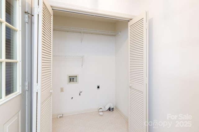 clothes washing area featuring laundry area, hookup for a washing machine, and electric dryer hookup