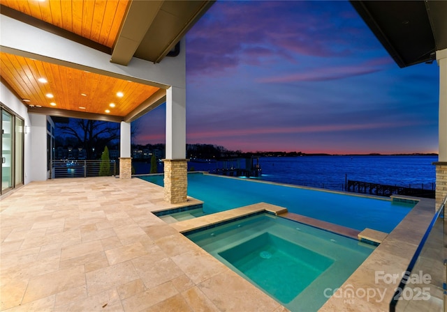 18601 Bluff Point Rd, Cornelius, NC 28031 - outdoor pool with a patio, a water view, and an in ground hot tub