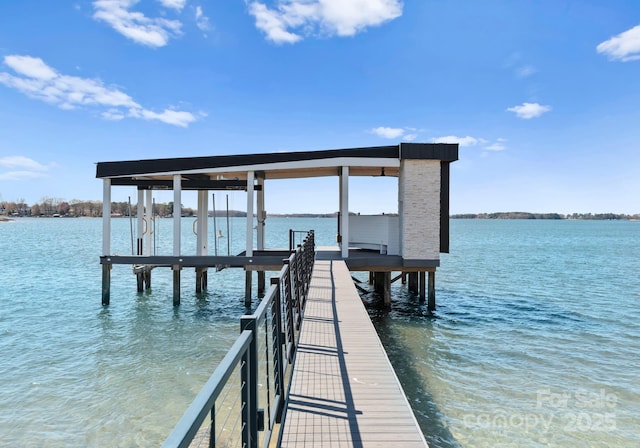 18601 Bluff Point Rd, Cornelius, NC 28031 - view of dock featuring a water view and boat lift