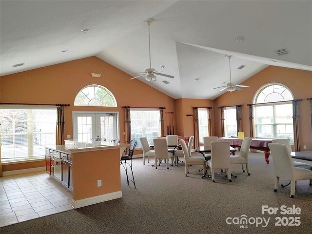 824 Wynnshire Dr Unit D, Hickory, NC 28601 - dining space featuring a ceiling fan, light colored carpet, high vaulted ceiling, and french doors