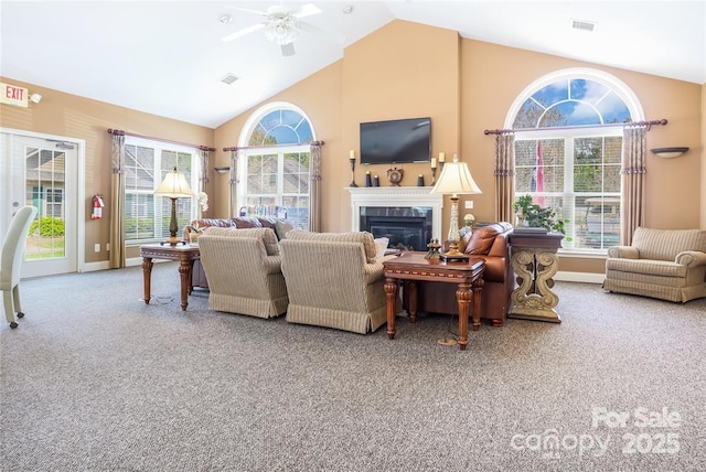 824 Wynnshire Dr Unit D, Hickory, NC 28601 - carpeted living area featuring a ceiling fan, a glass covered fireplace, high vaulted ceiling, and baseboards