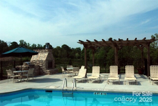 824 Wynnshire Dr Unit D, Hickory, NC 28601 - community pool with an outdoor brick fireplace, a patio, a pergola, and area for grilling