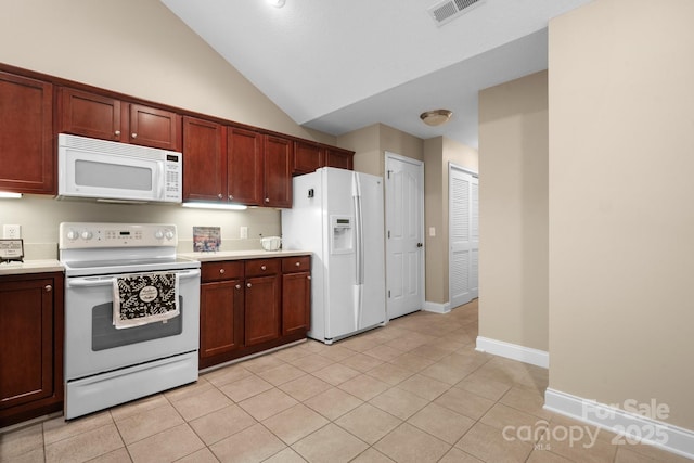 824 Wynnshire Dr Unit D, Hickory, NC 28601 - kitchen with white appliances, light countertops, vaulted ceiling, light tile patterned flooring, and baseboards
