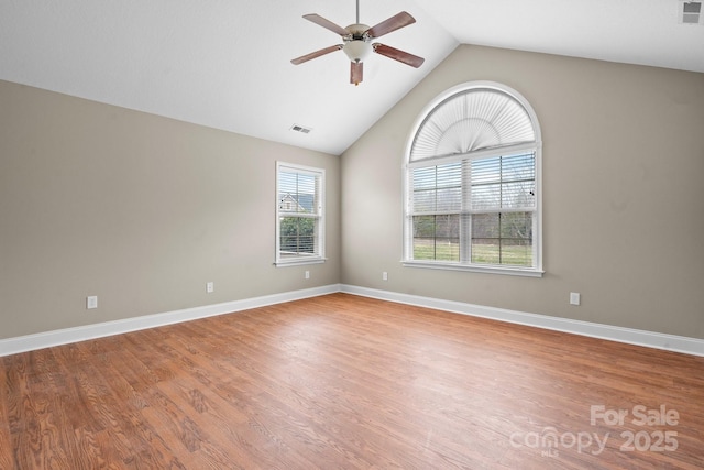 824 Wynnshire Dr Unit D, Hickory, NC 28601 - spare room featuring a ceiling fan, wood finished floors, lofted ceiling, and baseboards