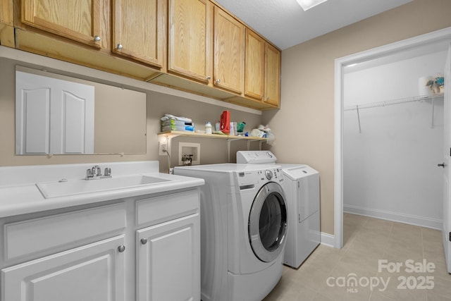 824 Wynnshire Dr Unit D, Hickory, NC 28601 - laundry room with washing machine and dryer, light tile patterned floors, cabinet space, and baseboards