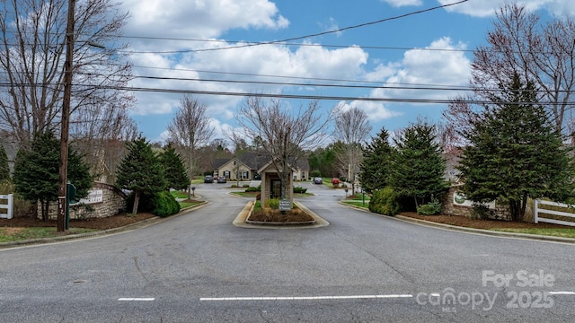 824 Wynnshire Dr Unit D, Hickory, NC 28601 - view of asphalt road with curbs
