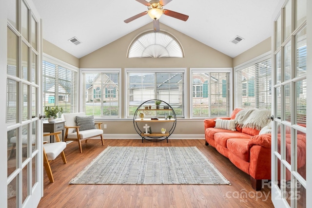 824 Wynnshire Dr Unit D, Hickory, NC 28601 - sunroom / solarium with plenty of natural light, lofted ceiling, wood finished floors, and baseboards