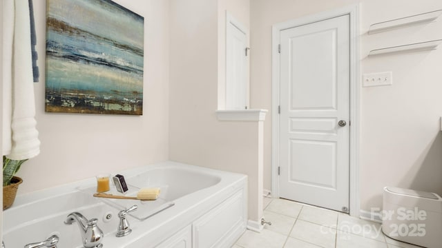 full bath featuring tile patterned flooring and a tub with jets