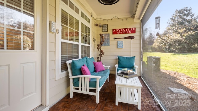 view of patio / terrace with a porch and an outdoor hangout area