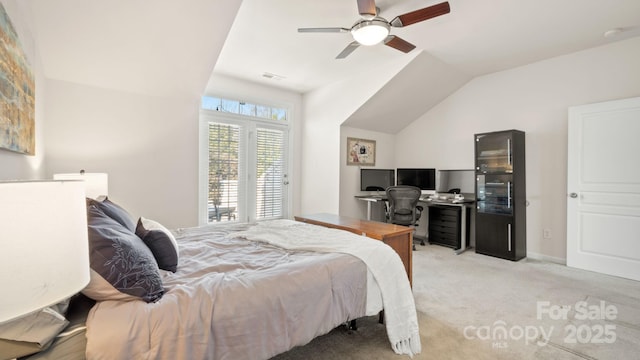 bedroom featuring visible vents, light colored carpet, a ceiling fan, and lofted ceiling