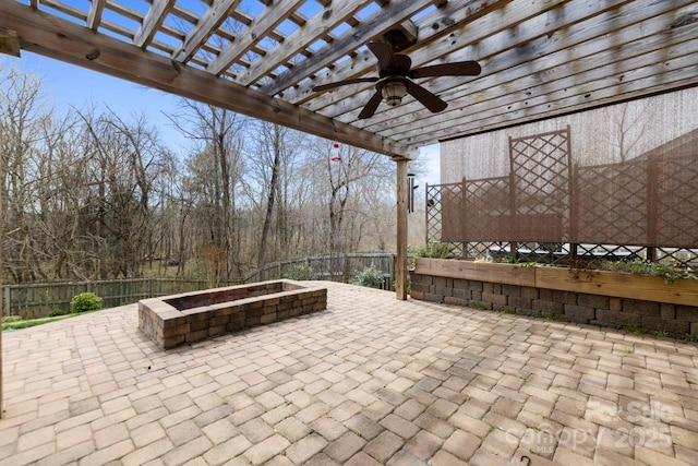 view of patio / terrace with fence, a pergola, and ceiling fan