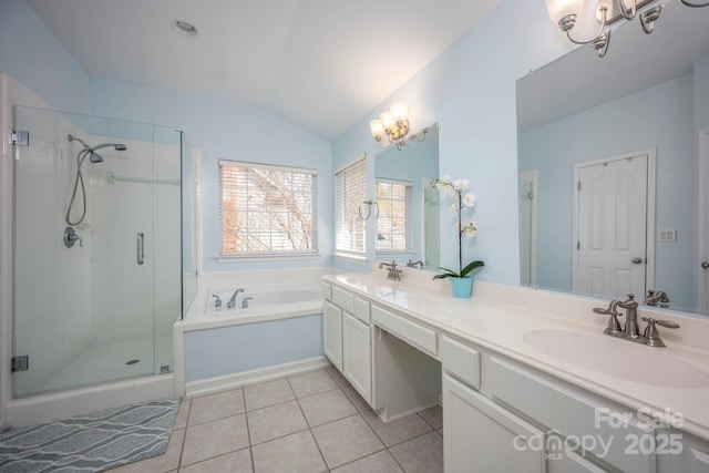 bathroom with a sink, an inviting chandelier, a shower stall, tile patterned flooring, and a bath
