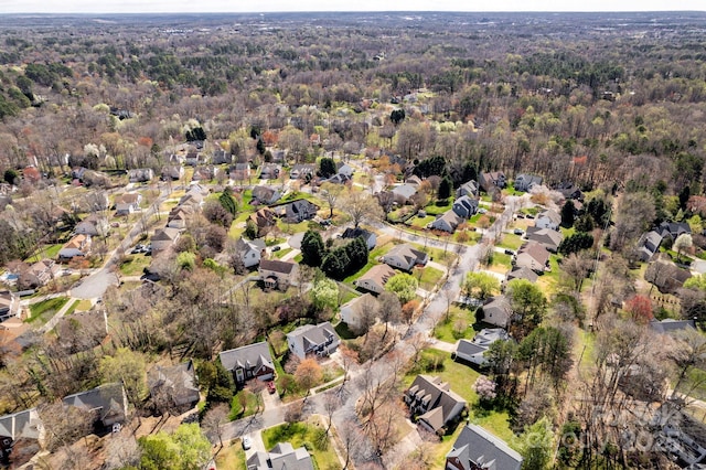 bird's eye view with a residential view and a forest view