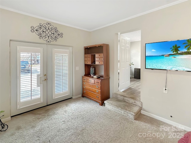 living room with light carpet, french doors, crown molding, and baseboards