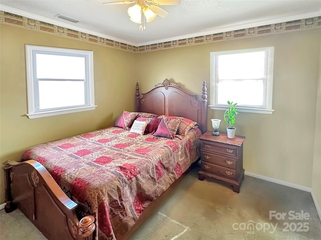 carpeted bedroom with baseboards and a ceiling fan