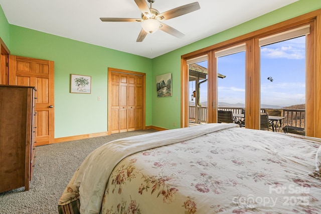 carpeted bedroom with a closet, a ceiling fan, baseboards, and access to outside