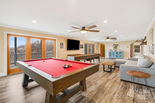 playroom with recessed lighting, light wood-style floors, and ornamental molding