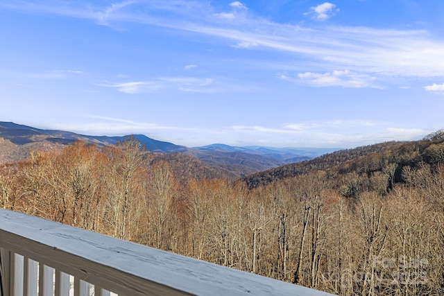 property view of mountains featuring a wooded view