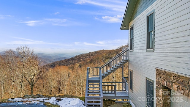 mountain view featuring a forest view