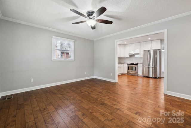 unfurnished living room featuring crown molding, baseboards, and dark wood-style flooring