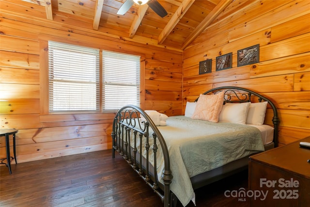 bedroom with lofted ceiling with beams, wood-type flooring, wooden ceiling, and wood walls