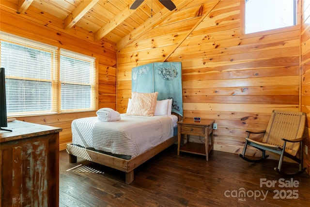 bedroom with wooden ceiling, lofted ceiling with beams, wooden walls, and dark wood-style flooring