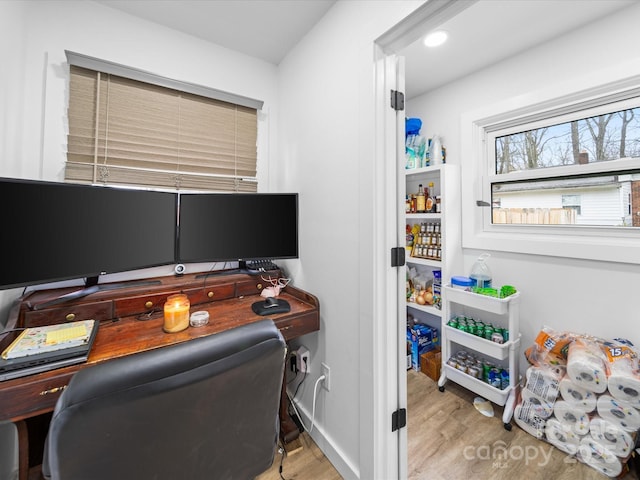 office area with recessed lighting and wood finished floors