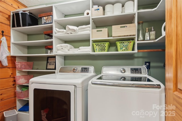 laundry room featuring laundry area and washing machine and dryer