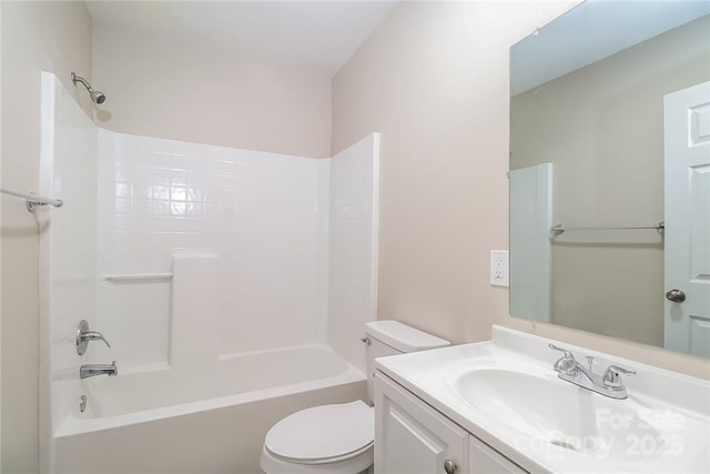 full bathroom with shower / bath combination, toilet, and vanity