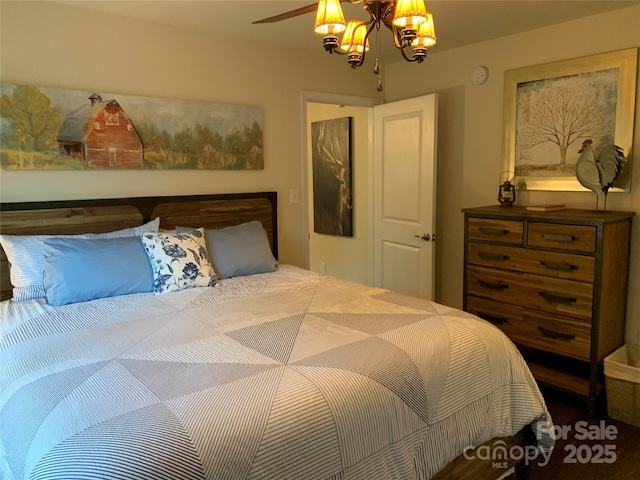 bedroom with a chandelier