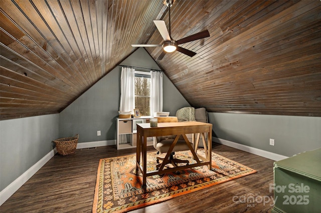 office featuring ceiling fan, baseboards, lofted ceiling, and wood finished floors