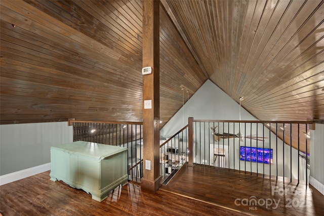 hall featuring hardwood / wood-style floors, lofted ceiling, an upstairs landing, and wooden ceiling