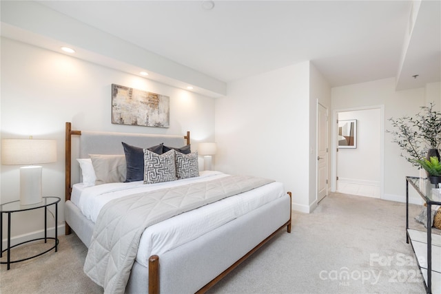 carpeted bedroom with recessed lighting and baseboards